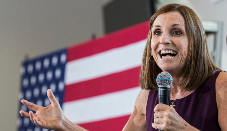 FILE--In this Oct. 12, 2018, file photo, U.S. Rep. Martha McSally, R-Ariz., addresses her constituents during a Get Out the Vote Rally in Gilbert, Ariz. Democrat Kyrsten Sinema and McSally will confront each other at a debate Monday, Oct. 15, 2018, in a race for the seat being vacated by retiring Sen. Jeff Flake, which could determine which party controls the Senate next year.