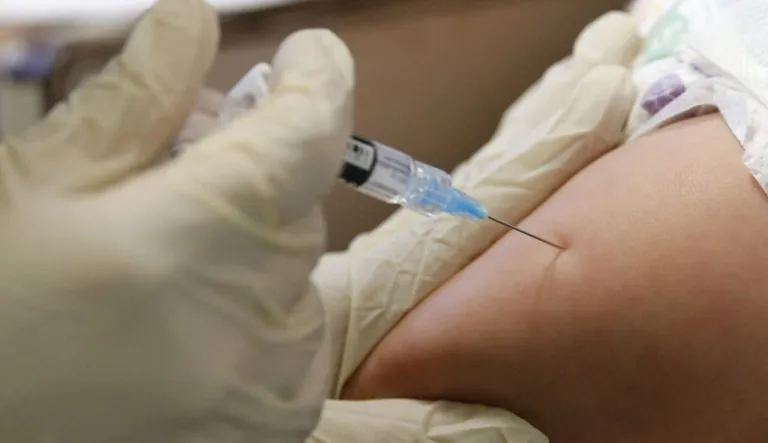 A patient receiving a vaccine.