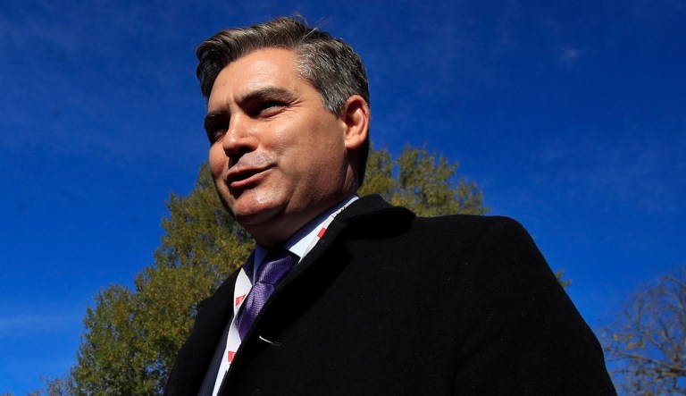 CNN's Jim Acosta speaks to journalists on the North Lawn upon returning back to the White House in Washington, Friday, Nov. 16, 2018.