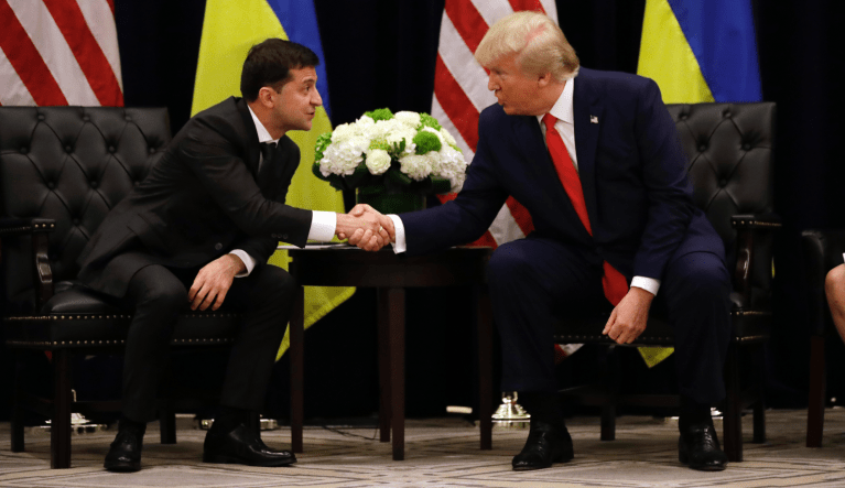 FILE - In this Wednesday, Sept. 25, 2019 file photo, President Donald Trump meets with Ukrainian President Volodymyr Zelenskiy at the InterContinental Barclay New York hotel during the United Nations General Assembly in New York. The House impeachment inquiry is zeroing in on two White House lawyers privy to a discussion about moving a memo recounting President Donald Trumpâs phone call with the leader of Ukraine into a highly restricted computer system normally reserved for documents about covert action. (AP Photo/Evan Vucci, File)