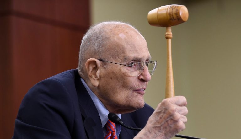 Former Michigan Rep. John Dingell holds up the gavel he used 50 years ago when Medicare legislation was passed, as he speaks at an event marking the 50th Anniversary of Medicare and Medicaid, Wednesday, July 29, 2015, on Capitol Hill in Washington.