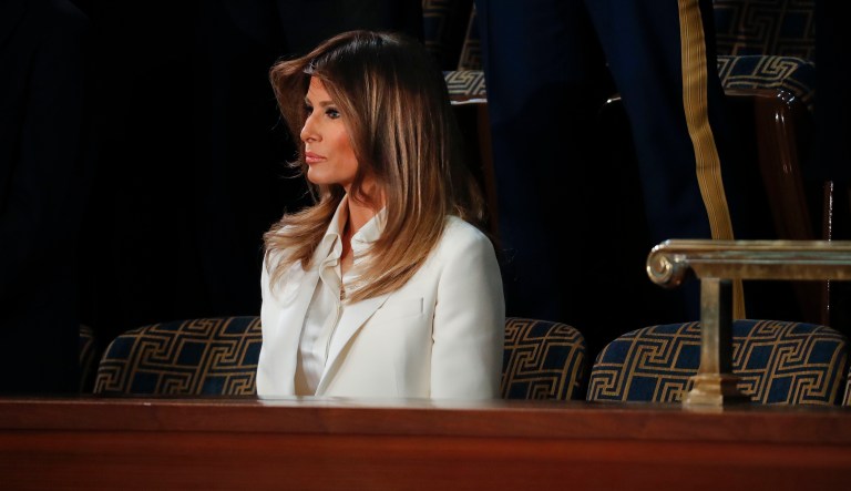 First lady Melania Trump takes her seat to watch her husband President Donald Trump address a joint session of Congress on Capitol Hill in Washington, Tuesday, Jan. 30, 2018.