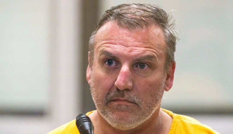 Brian Steven Smith is shown being arraigned on a charge of first-degree murder at the Anchorage Jail courtroom Wednesday, Oct. 9, 2019, in Anchorage, Alaska. Smith was in custody after videos were found on a digital memory card depicting a woman being assaulted and killed, police in Alaska said Wednesday.