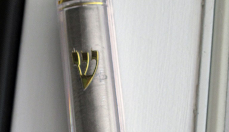 In this June 30, 2013 photo, a new mezuzah hangs in the doorway of Jake Matilsky's home in Helena, Mont.