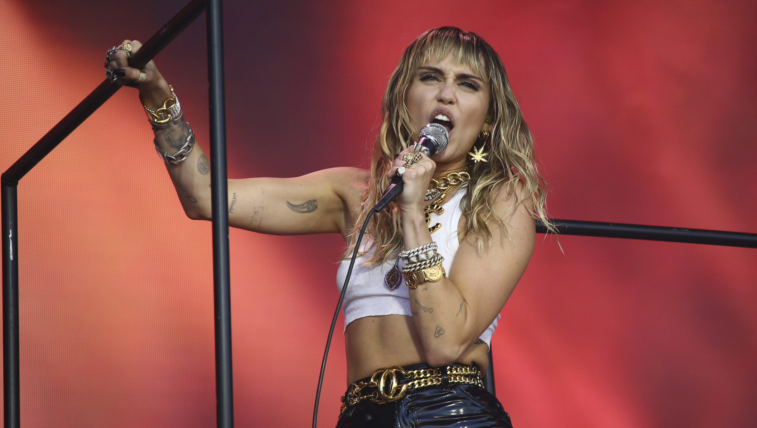 Miley Cyrus, Green Day span decades in pre-Super Bowl show