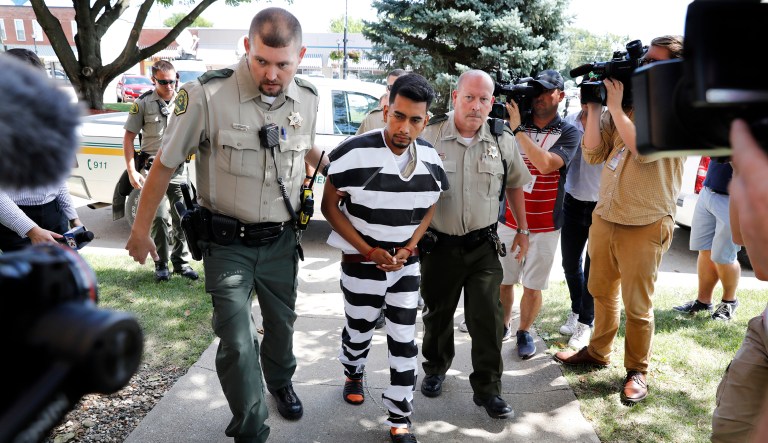 Cristhian Bahena Rivera is escorted into the Poweshiek County Courthouse for his initial court appearance, Wednesday, Aug. 22, 2018, in Montezuma, Iowa. Rivera is charged with first-degree murder in the death of Mollie Tibbetts, who disappeared July 18 from Brooklyn, Iowa.