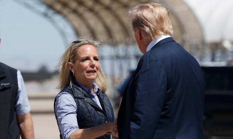 President Donald Trump greets Homeland Security Secretary Kirstjen Nielsen after he arrived on Air Force One at Naval Air Facility El Centro, in El Centro, Calif., Friday April 5, 2019. (AP Photo/Jacquelyn Martin)