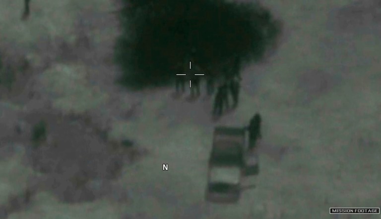 In this image from video released by the Department of Defense, Niger military members arrive at the scene where the body of Army Sgt. La David T. Johnson, 25, of Miami Gardens, Fla., was recovered after an ambush that killed four U.S. service members in October 2017 in Niger. The dramatic new drone video, released May 17, 2018, of the ambush that killed four American soldiers shows U.S. forces desperately trying to escape, and fighting for their lives after friendly Nigerien forces mistook them for the enemy.