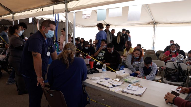 In a tiny border town, a non-profit health center has turned into a logistics site to help migrants to reach their final destination in the United States.