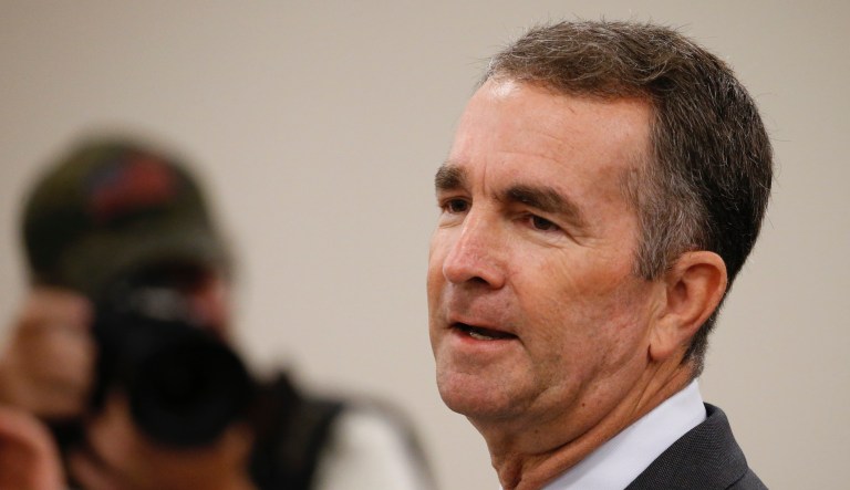 FILE - In this Aug. 20, 2019, file photo, Virginia Gov. Ralph Northam delivers his budget update before a joint meeting of the House and Senate money committees at the Capitol in Richmond, Va. Northam announced Monday, Dec. 9, that his budget proposal will include about $22 million for efforts to improve health outcomes for mothers and babies and reduce the racial disparity in the stateâs maternal mortality rate.