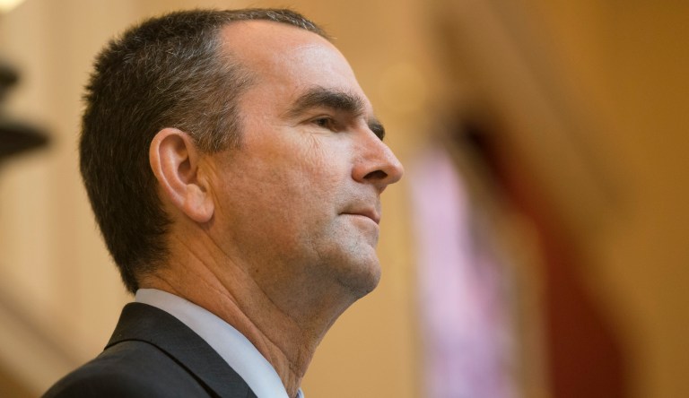 Virginia Gov. Ralph Northam, gestures as he delivers his budget briefing before a meeting of the House Appropriations Committee and the Senate Finance Committee at the Capitol  in Richmond, Va., Tuesday, Dec. 17, 2019.