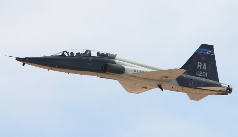 A T-38C Talon aircraft departs an air base.
