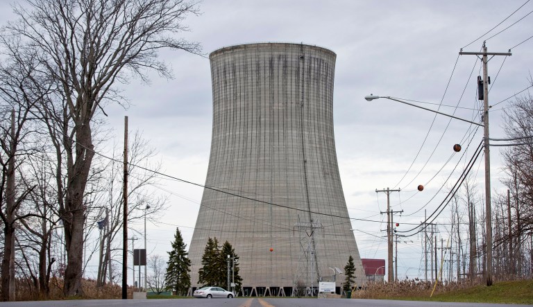 FILE- This photo from Nov. 29, 2016 shows the Nine Mile Point nuclear power plant in Oswego, N.Y. New York Gov. Andrew Cuomo's plan to invest up to $7.6 billion in ratepayer subsidies over 12 years to bail out three aging nuclear plants is being criticized by a conservative free market group that says it's unfair to consumers.