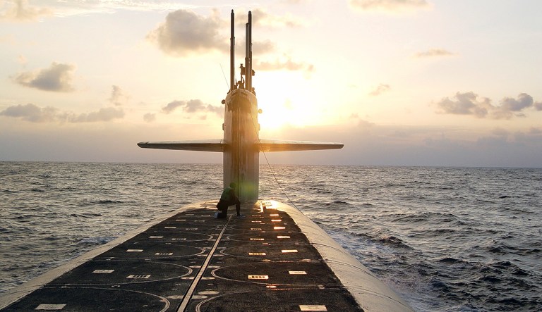 In this Jan. 9, 2008 photo released by the U.S. Navy, tThe Ohio-class ballistic-missile submarine USS Wyoming approaches Naval Submarine Base Kings Bay, Ga.  Nuclear-armed U.S. submarines that went more than a decade without calling on foreign ports in part because of post-Sept. 11 security concerns are once again visiting other countries, a shift intended to underscore their global presence and lift sailor morale. A stop in September 2015 by USS Wyoming in the United Kingdom was the first of what are expected to be occasional visits to foreign ports.