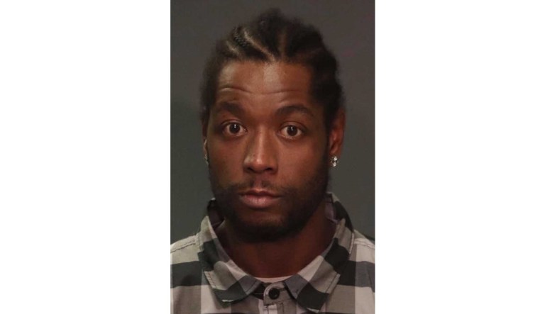 Previous booking photo of Marc Gomez.