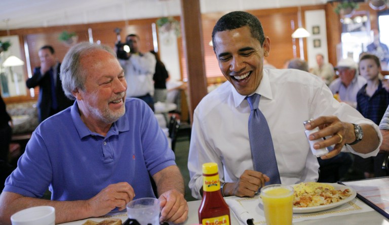 Democratic presidential hopeful, Sen. Barack Obama, D-Ill., right, and Rick Jones, 59, chat while eating breakfast at Four Seasons Family Restaurant in Greenwood, Ind., Tuesday, May 6, 2008, as voters in both Indiana and North Carolina crowd polling places Tuesday for the states' primary elections. 