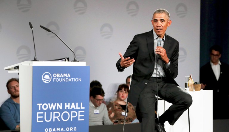Former US President Barack Obama gestures as he speaks during a town hall meeting at the 'European School For Management And Technology' (ESMT) in Berlin, Germany, Saturday, April 6, 2019.