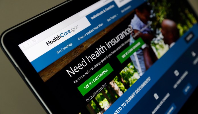 FILE - In this May 18, 2017 file photo, the Healthcare.gov website is seen on a laptop computer, in Washington. Former Obama administration officials say they're launching a private campaign to encourage people to sign up for coverage next year under the Affordable Care Act. With the start of open enrollment just weeks away on Nov. 1, the Trump administration has slashed "Obamacare's" ad budget, as well as grants to outside organizations that are supposed to help consumers sign up.