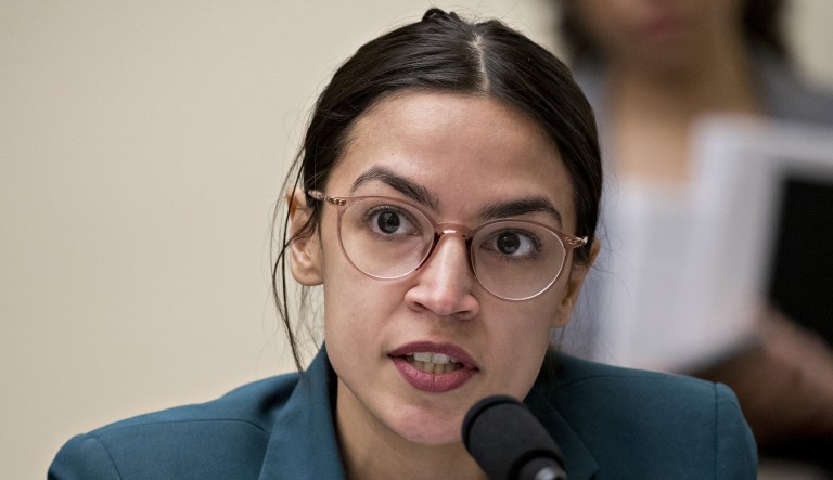 Representative Alexandria Ocasio-Cortez, a Democrat from New York, questions Tim Sloan, president and chief executive officer of Wells Fargo & Co., not pictured, during a House Financial Services Committee hearing in Washington, D.C., U.S., on Tuesday, March 12, 2019. 