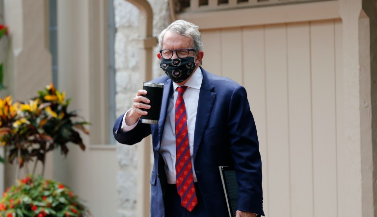 Illinois and Ohio add restrictions as pandemic hits Midwest