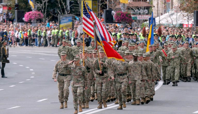 U.S. soldiers march along main Khreshchatyk Street during a military parade to celebrate Independence Day in Kyiv, Ukraine, on Aug. 24, 2017.