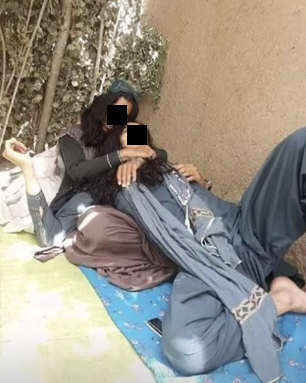 Two sources indicate this is a suspected Taliban commander reclining with his dancing boy in his arms. One source indicated he worked in an eastern province and kept several bacha be reeshi, or dancing boys, with him. They said the individuals pictured above were killed during a special forces raid three years ago. 