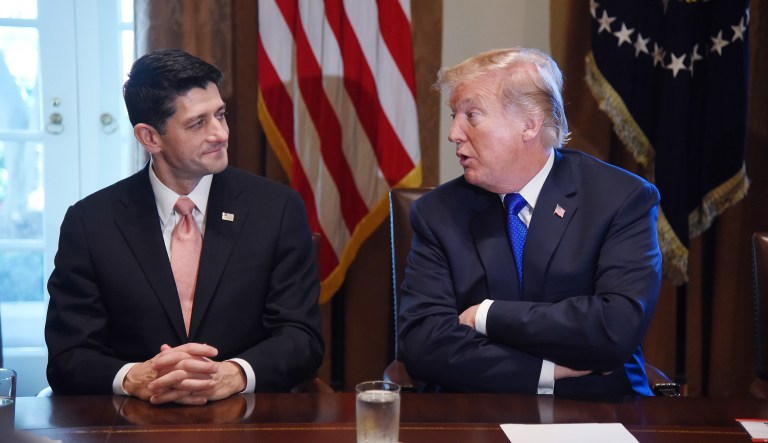 U.S. President Donald Trump, speaks while U.S. House Speaker Paul Ryan, a Republican from Wisconsin, left, listens during a meeting in the Cabinet Room of the White House in Washington, D.C., U.S., on Thursday, Nov. 2, 2017. The House tax bill released Thursday preserves the carried interest tax break despite TrumpÂ and GOP leaders' promise to do away with loopholes for the wealthy.