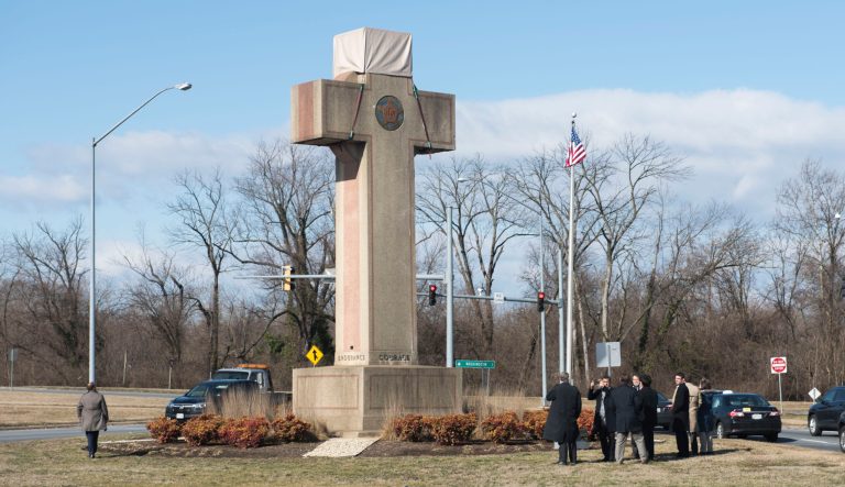 Visitors walk around the 40-foot Maryland Peace Cross dedicated to World War I soldiers on Wednesday, Feb. 13, 2019, in Bladensburg, Md. 