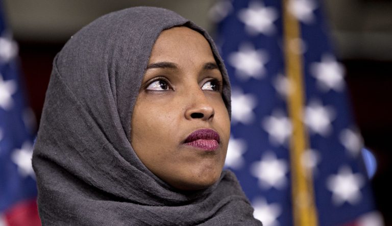 Rep. Ilhan Omar, D-Minn., listens during a news conference on Capitol Hill in Washington, D.C., on Friday, Nov, 30, 2018.