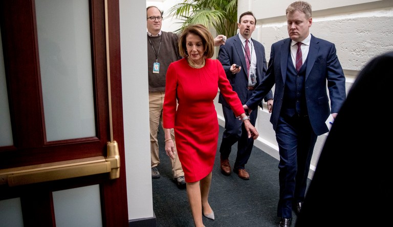 House Speaker Nancy Pelosi of Calif. arrives for a House Democratic Caucus meeting on Capitol Hill in Washington, Wednesday, Jan. 23, 2019.