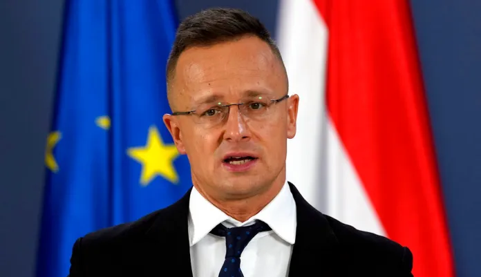 Hungarian Foreign Minister Peter Szijjarto speaks during a press conference after talks with his Serbian counterpart Nikola Selakovic, in Belgrade, Serbia, Monday, Feb. 7, 2022. Szijjarto is on a one-day visit to Serbia.