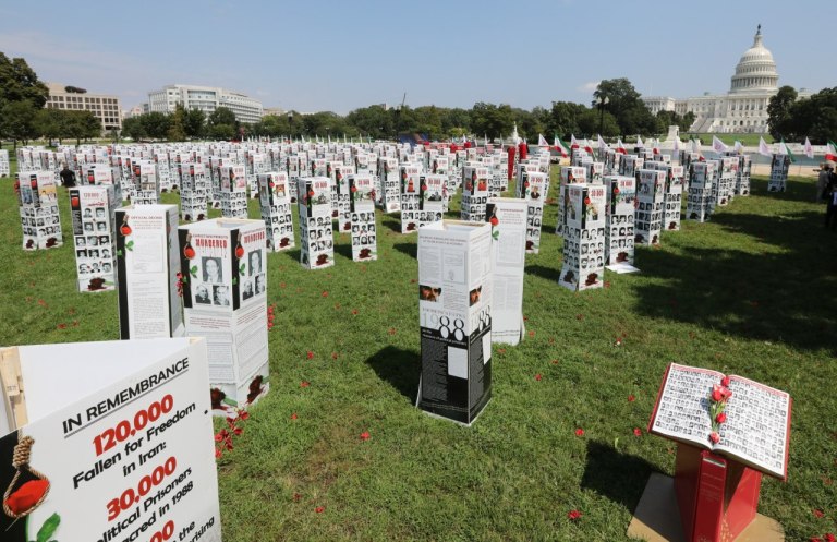 Displays show the photos of thousands of people killed by Iran over the past decades. The photos were set up outside of Capitol Hill on Friday.