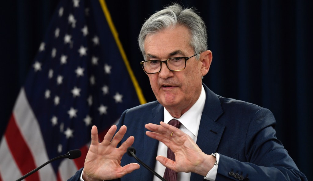 Federal Reserve board votes to cut interest rates
