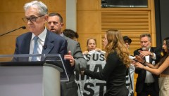 Climate protesters disrupt speech by Fed Chairman Jerome Powell