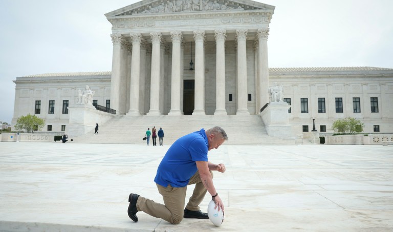 Coach who won legal fight to pray on field vows to kneel again: ‘I get to bring God back’