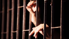 After prison, an escaped Iranian dissident fears for his family, he says