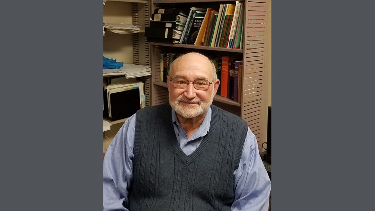Geography Professor Tom Maraffa in his office at Youngstown State University.