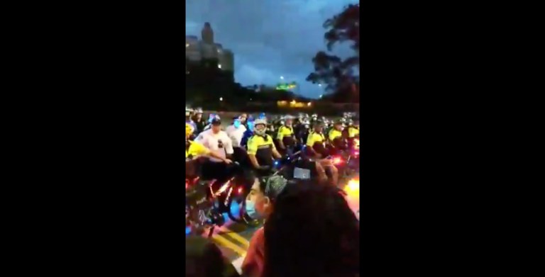 NYPD form police line during clashes in Bayridge, Brooklyn between pro-cop group and BLM activists