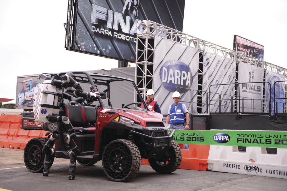 RoboSimian is a NASA Jet Propulsion Laboratory robot capable of mobility and manipulation. Shown in 2015, the robot had just exited a vehicle it had driven as part of the DARPA Robotics Challenge Finals.