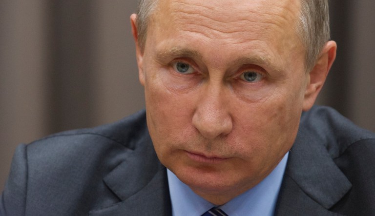 Russian President Vladimir Putin listens to German Vice Chancellor and Economy Minister Sigmar Gabriel during their meeting at the Novo-Ogaryovo residence outside Moscow, Russia, on Wednesday, Sept. 21, 2016.