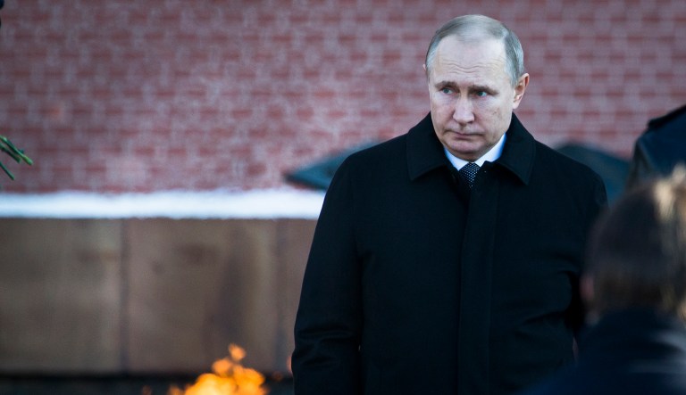 Russian President Vladimir Putin attends a wreath-laying ceremony at the Tomb of the Unknown Soldier in Moscow, Russia, Friday, Feb. 23, 2018. The Defenders of the Fatherland Day, celebrated in Russia on Feb. 23, honors the nation's military and is a nationwide holiday.
