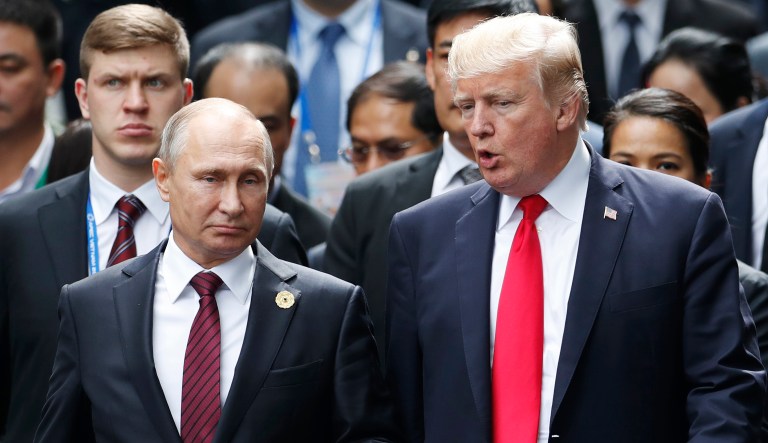 FILE - In this Nov. 11, 2017 photo, U.S. President Donald Trump and Russia's President Vladimir Putin talk during the family photo session at the APEC Summit in Danang, Vietnam. Trump repeatedly declared in his presidential campaign that he would improve relations with Russia but was never specific. A year into his presidency, itâs no more clear. Moscow and Washington are at odds over issues ranging from North Korea to Ukraine, despite Trumpâs open admiration of Putin. 
