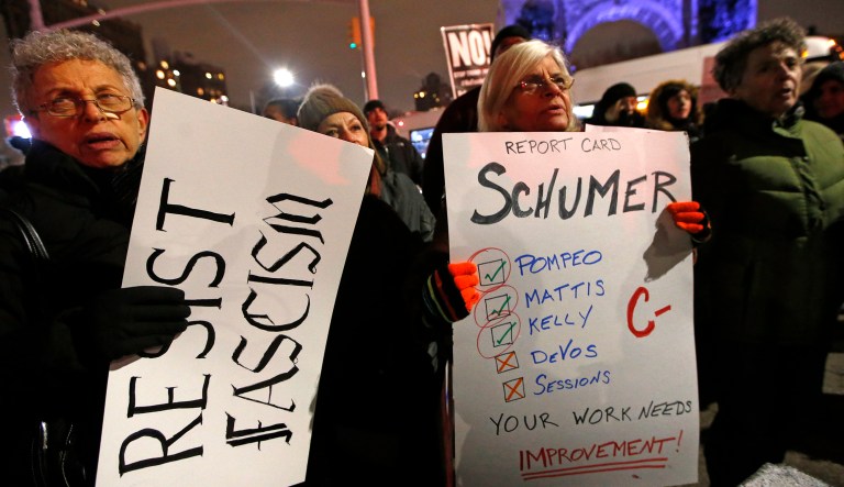 Demonstrators gather in Brooklyn's Grand Army Plaza, during the first in a series of "Resist Trump Tuesdays," on Tuesday, Jan. 31, 2017, in New York. Many demonstrators called for Senate Minority leader Chuck Schumer to mount a more vigorous opposition to the agenda of President Donald Trump.