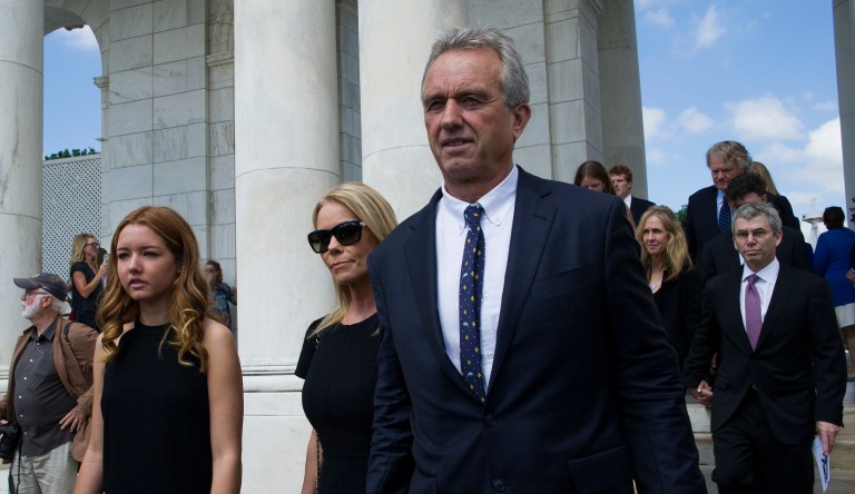 Robert F. Kennedy Jr. and his wife Cheryl Hines, center, arrive for the Celebration of the Life of Robert F. Kennedy at Arlington National Cemetery in Arlington, Wednesday, June 6, 2018. Former President Bill Clinton and members of the Kennedy family are marking the 50th anniversary of Robert F. Kennedy's death.  Kennedy, a former attorney general and presidential candidate, was assassinated 50 years ago at the age of 42. The Navy veteran is buried at Arlington near his brother, former President John F. Kennedy.