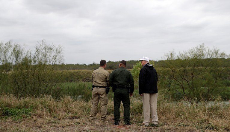 In this Jan. 10, 2019, file photo President Donald Trump, far right, tours the U.S. border with Mexico at the Rio Grande on the southern border in McAllen, Texas.