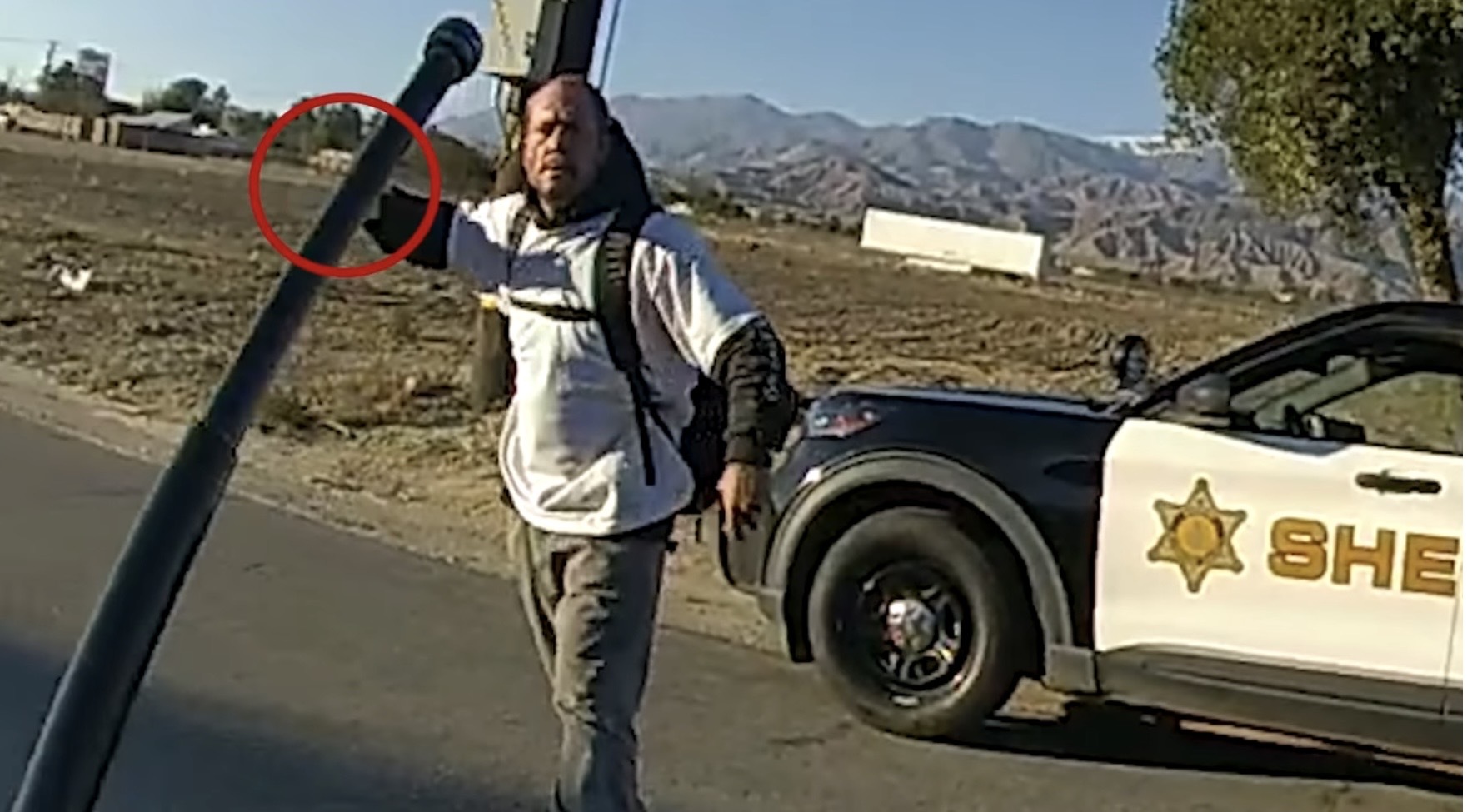 Meat cleaver-wielding suspect shot dead by police in video released by authorities