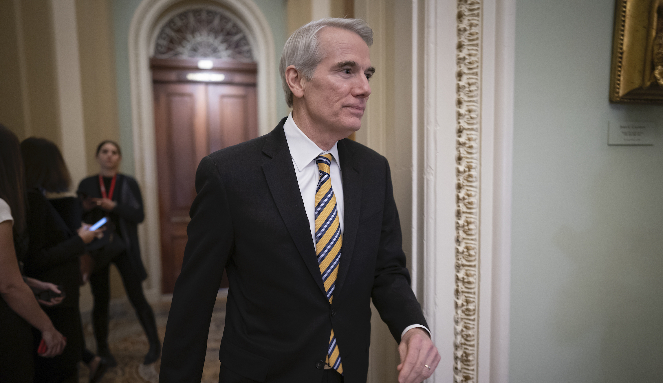 Senator donates salary while colleague pushes pay freeze
