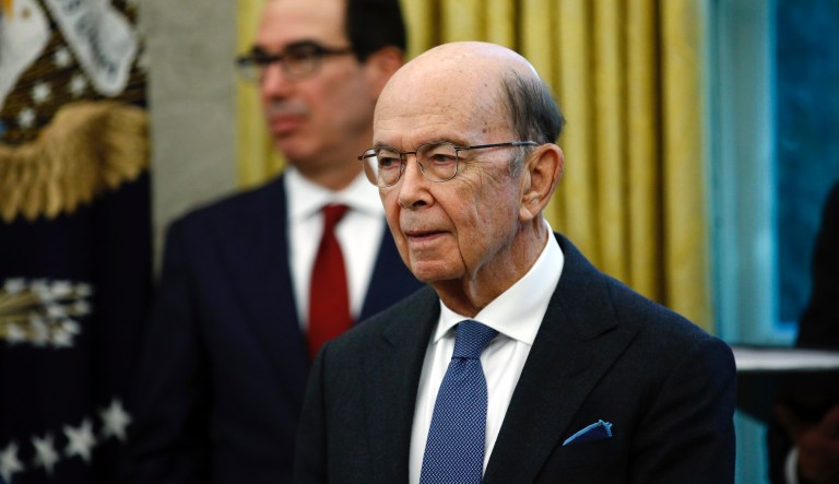 Commerce Secretary Wilbur Ross, front and Treasury Secretary Steven Mnuchin listen as President Donald Trump and Turkish President Recep Tayyip Erdogan meet in the Oval Office with Republican senators at the White House Wednesday, Nov. 13, 2019, in Washington.