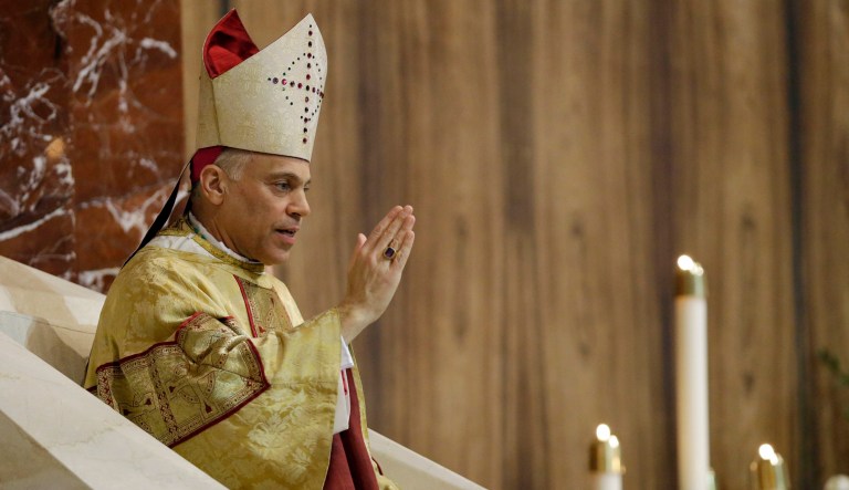 Salvatore J. Cordileone gives a blessing sing during a ceremony to install him as the new archbishop of San Francisco at the Cathedral of St. Mary of the Assumption in San Francisco,  Thursday,  Oct. 4, 2012. 
