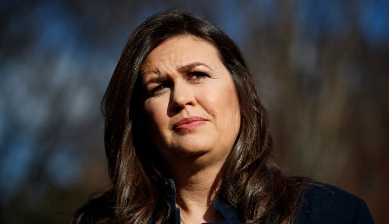 White House press secretary Sarah Sanders talks to reporters outside the White House, Wednesday, March 6, 2019, in Washington.